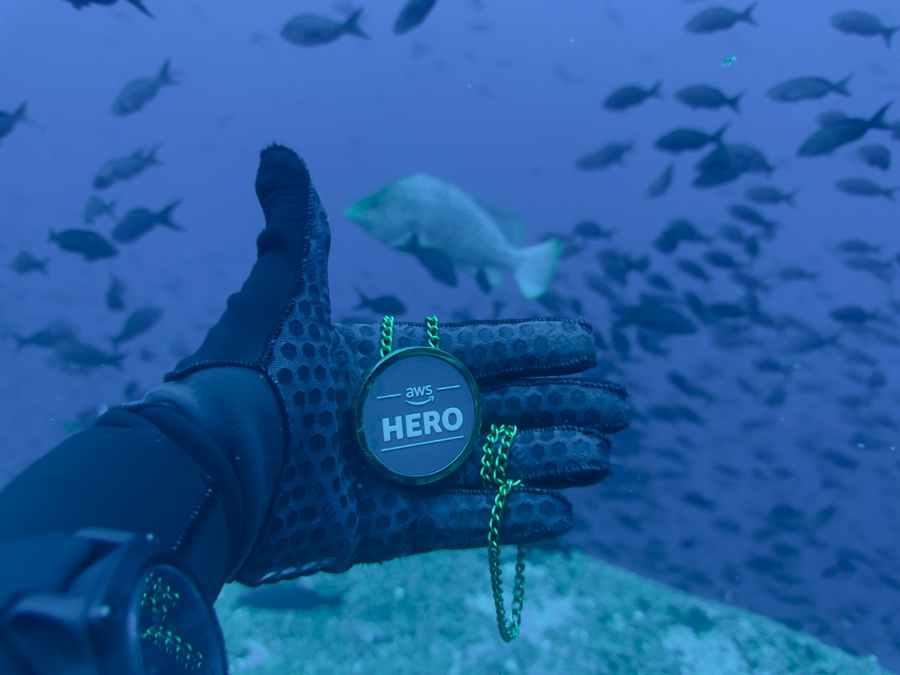 Technical diving with AWS Hero badge underwater